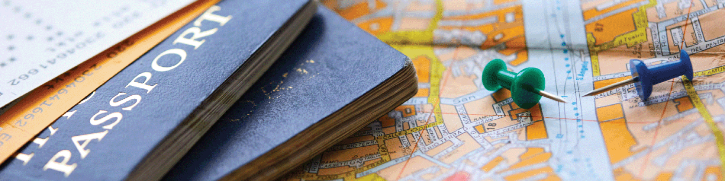 Travel image with passports and maps with push pins