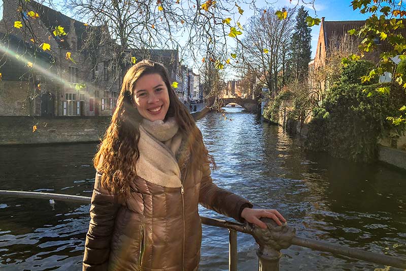 Claire Davenport poses for a picture against a scenic location in Prague, the capital of the Czech Republic, where she spent the fall semester learning about herself and central European politics.