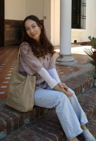 woman smiling sitting on patio