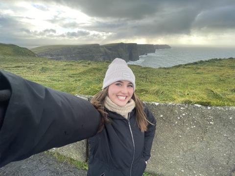 smiling selfie of woman outside 