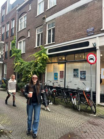 woman smiling in alley