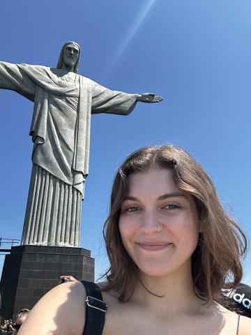 woman smiling by christ the redeemer statue